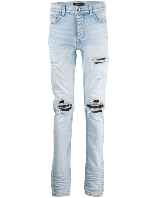 Amiri Denim Skinny Jeans MX1 Distressed in Blau für Herren Herren Bekleidung Jeans Röhrenjeans 