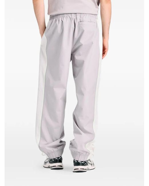 New Balance Purple Trackside Woven Track Pants for men