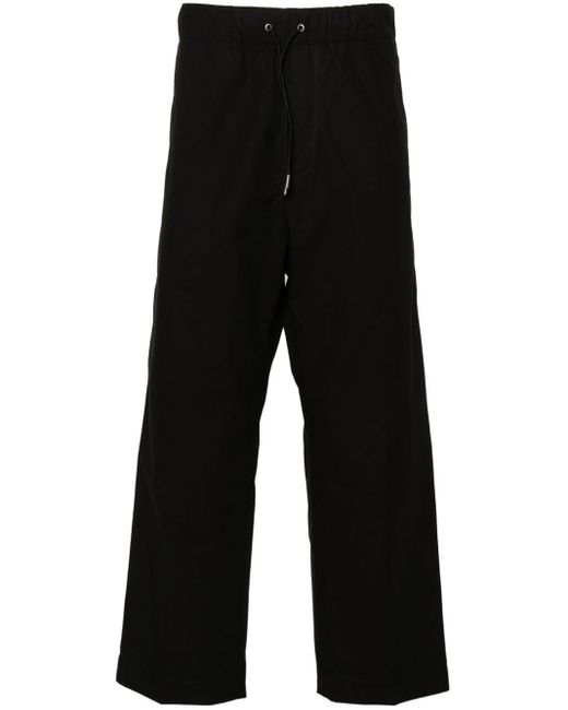 Pantaloni con coulisse di OAMC in Black da Uomo