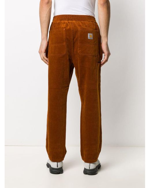 Carhartt WIP Elasticated Corduroy Trousers in Orange for Men - Lyst
