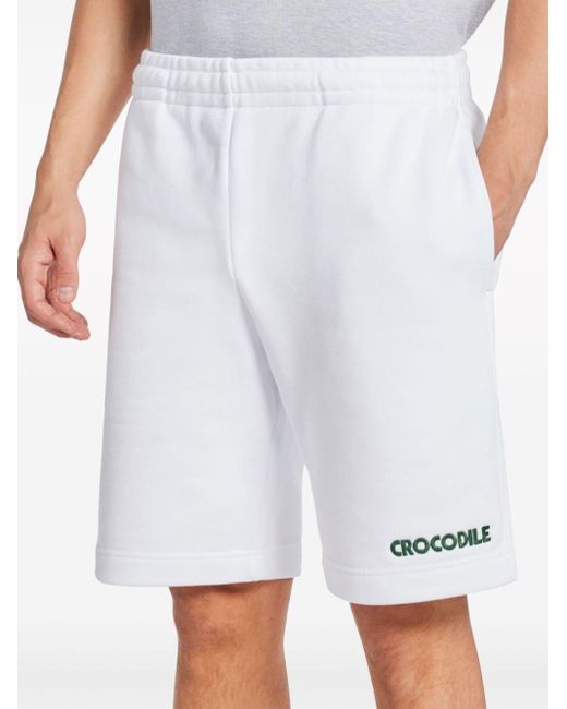 Pantalones cortos de deporte con eslogan bordado Lacoste de hombre de color White