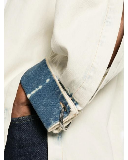Erika Cavallini Semi Couture White Cut-Out Ring-Detail Denim Jacket