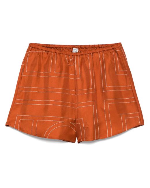Short En Soie À Motif Monogrammé Totême  en coloris Orange