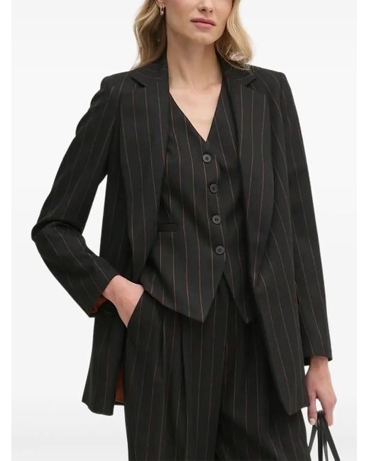 Blazer a rayas diplomáticas Sandro Ferrone de color Black