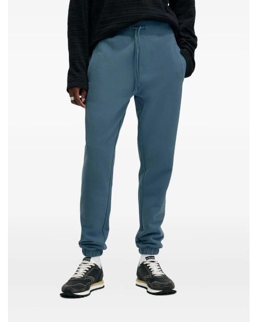 AllSaints Blue Raven Logo-Embroidered Track Pants for men