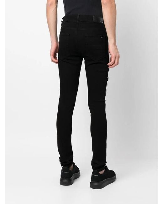 Amiri Black M.A. Track Skinny Jeans for men