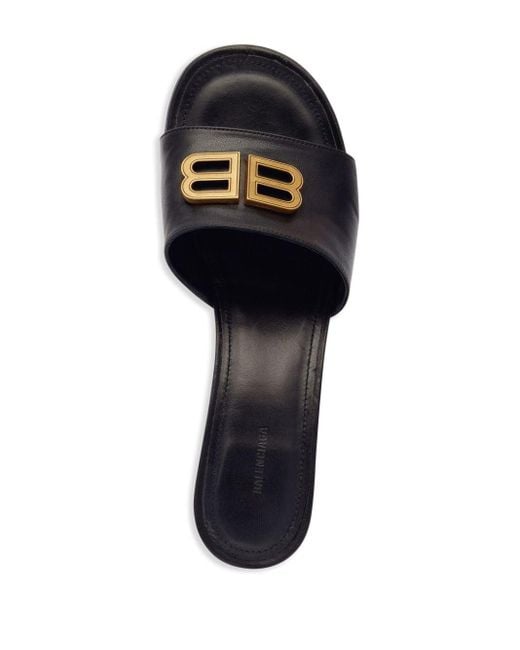 Balenciaga Black Groupie Mules mit Logo-Schild 50mm