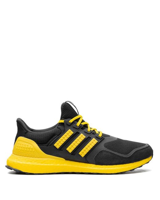 Sneakers x Lego Ultraboost DNA Core Black/Yellow/Core Black di Adidas