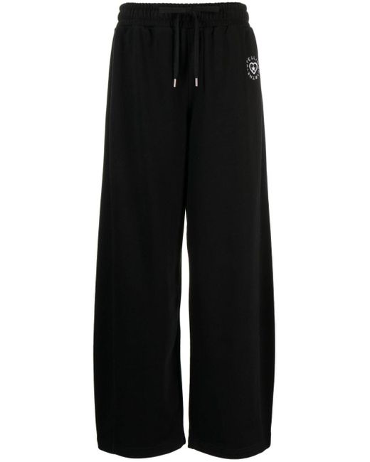 Pantaloni sportivi con applicazione logo di Stella McCartney in Black