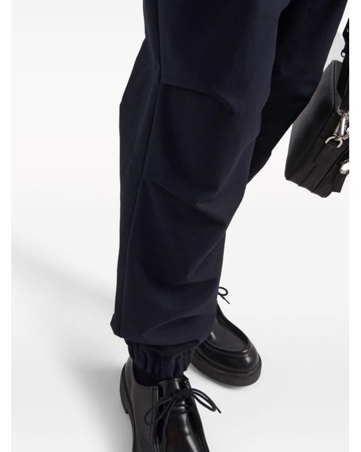 Pantalon de costume à logo triangle Prada pour homme en coloris Blue