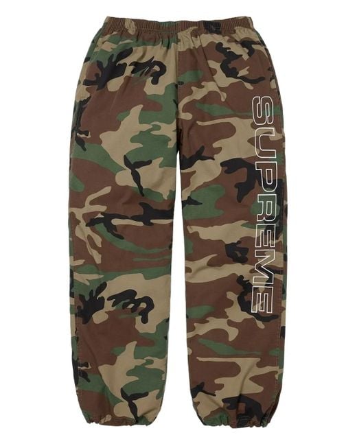 Supreme Spellout Ripstop Trainingsbroek Met Camouflageprint in het Green voor heren