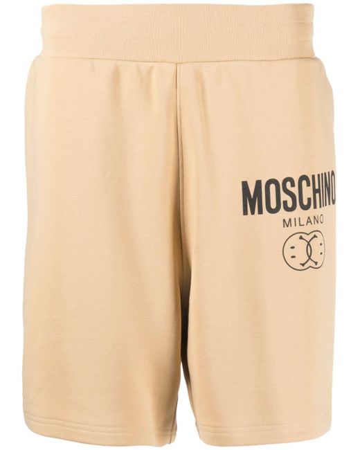 Shorts sportivi con stampa di Moschino in Natural da Uomo