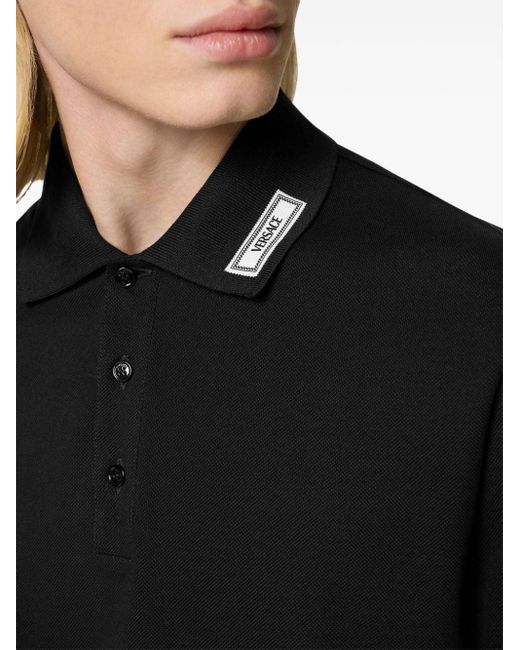 Versace Poloshirt mit Logo-Applikation in Black für Herren