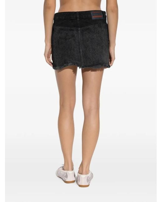 DIESEL Black Denim Mini Skirt With Side Pockets And Frayed Hem