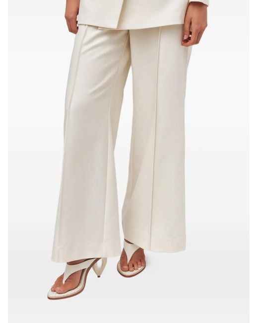 Aje. Natural Vortex Pressed-Crease Trousers