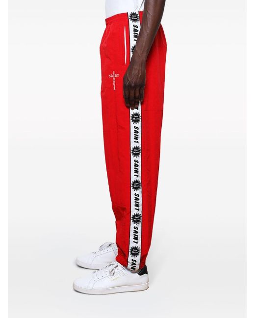 SAINT Mxxxxxx Red Logo-tape Track Pants for men