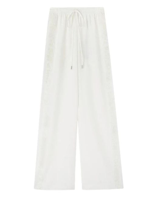Pantalones con bordado y raya lateral Ermanno Scervino de color White