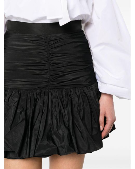 Minifalda con volantes Patou de color Black