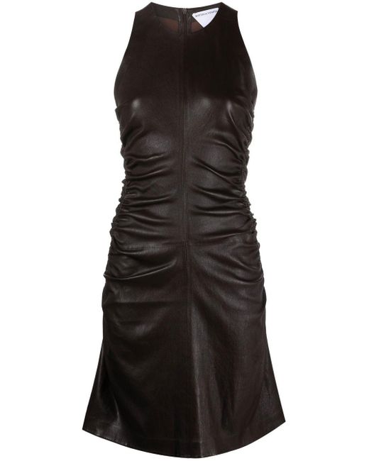 Robe courte en cuir Bottega Veneta en coloris Black