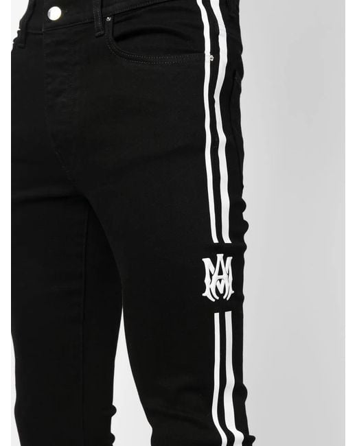 Amiri Black M.A. Track Skinny Jeans for men