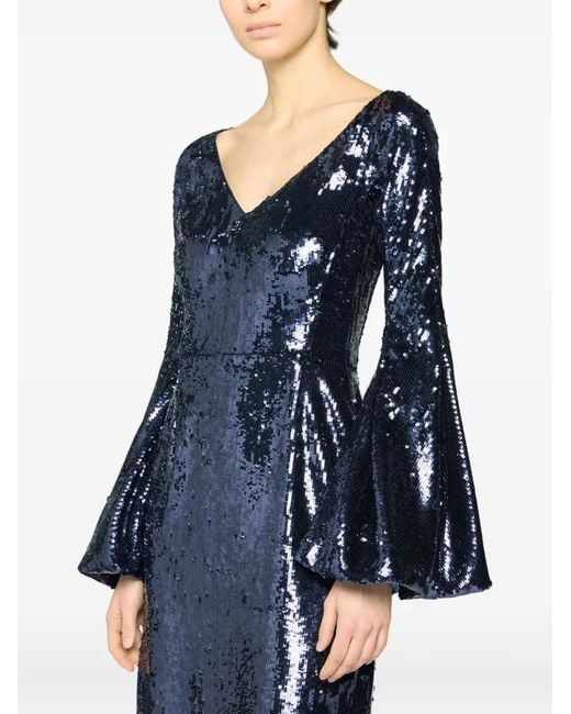 Genny Jurk Met Pailletten En Klokmouwen in het Blue