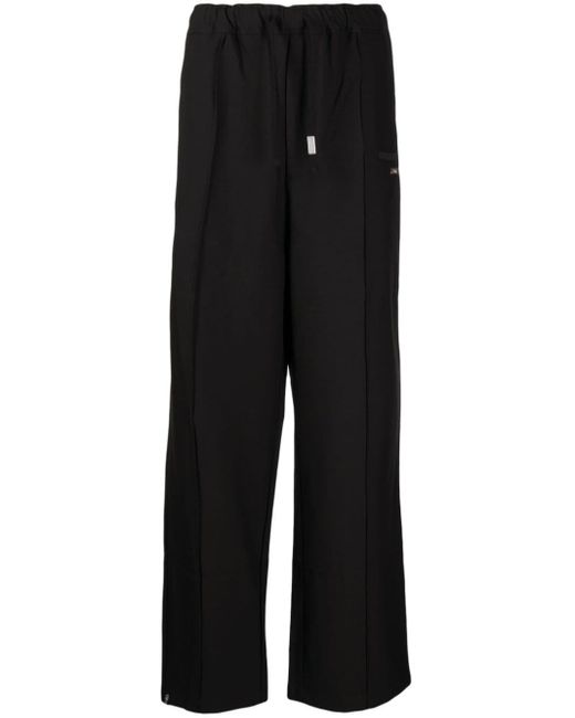 Pantalon droit à plaque logo Izzue pour homme en coloris Black