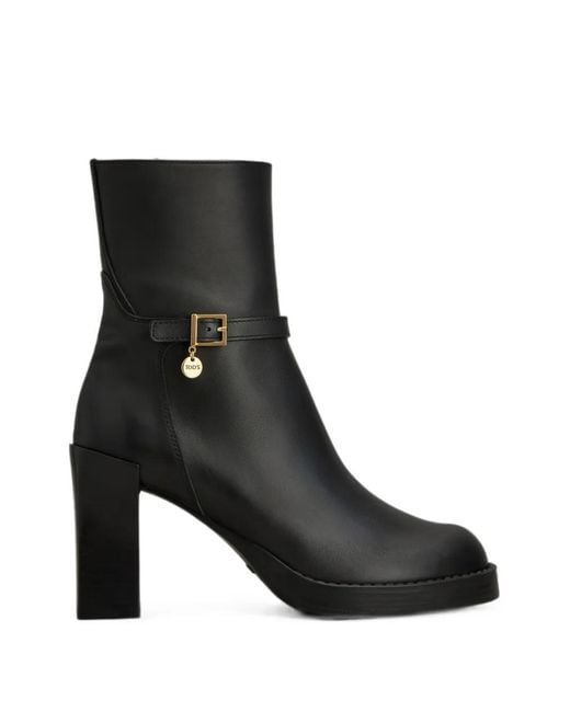 Tod's Black Buckle-Strap Logo-Pendant Ankle Boots