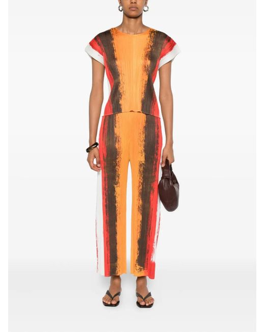 Pleats Please Issey Miyake Orange Pleated Stripe Trousers