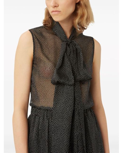 Chemise en soie à pois Nina Ricci en coloris Black