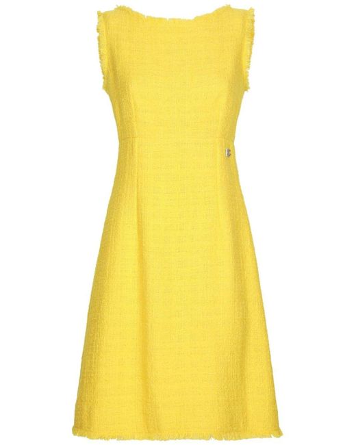 Vestido de tweed acampanado Dolce & Gabbana de color Yellow