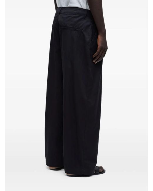 Osklen Black Fold Paper Trousers for men