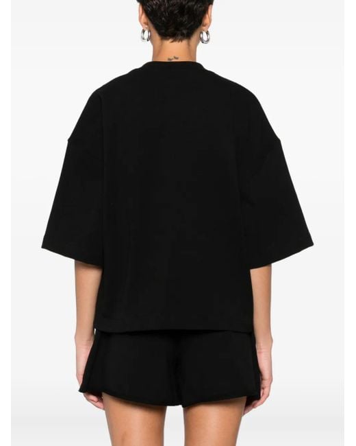 Camiseta con logo bordado Hamza de color Black