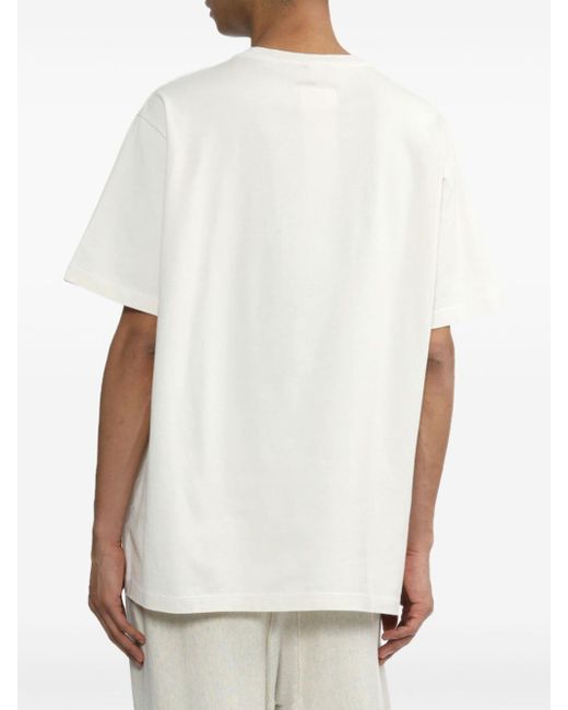 T-shirt en coton à texte imprimé Doublet pour homme en coloris White
