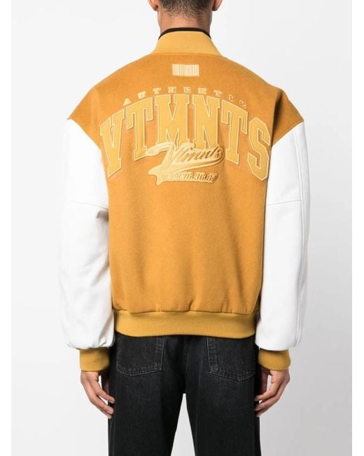 VTMNTS Orange College Varsity Bomber Jacket for men