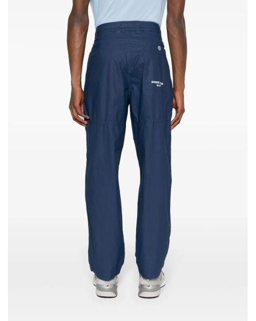 Stone Island Blue Logo-Print Trousers for men