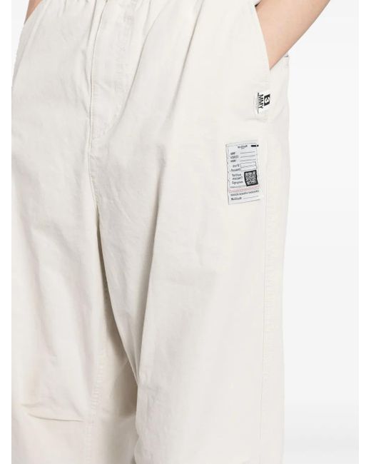 Pantalones Parachute con diseño rasgado Maison Mihara Yasuhiro de hombre de color White