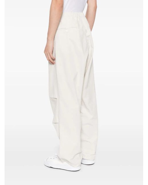 Pantalones Parachute con diseño rasgado Maison Mihara Yasuhiro de hombre de color White