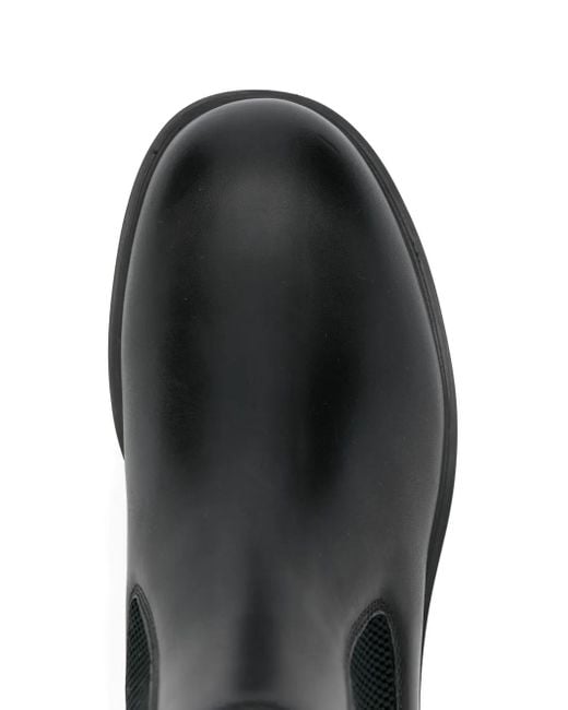 Elastic-panel leather boots Burberry de hombre de color Black