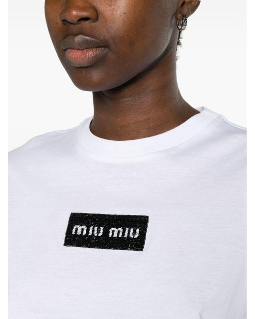 T-shirt crop à logo strassé Miu Miu en coloris White