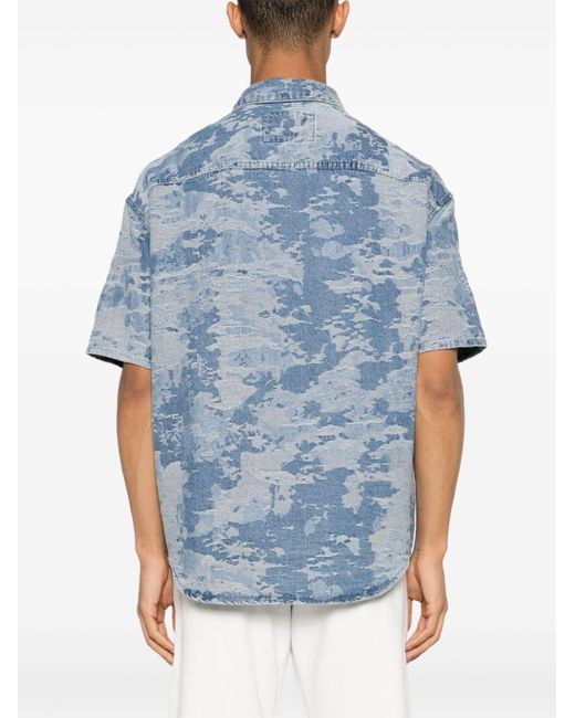 Camisa vaquera con motivo militar en jacquard Emporio Armani de hombre de color Blue