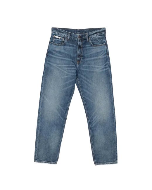 Calvin Klein Blue Logo-Patch Whiskered Jeans for men