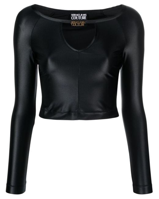 Top crop con placca logo di Versace in Black