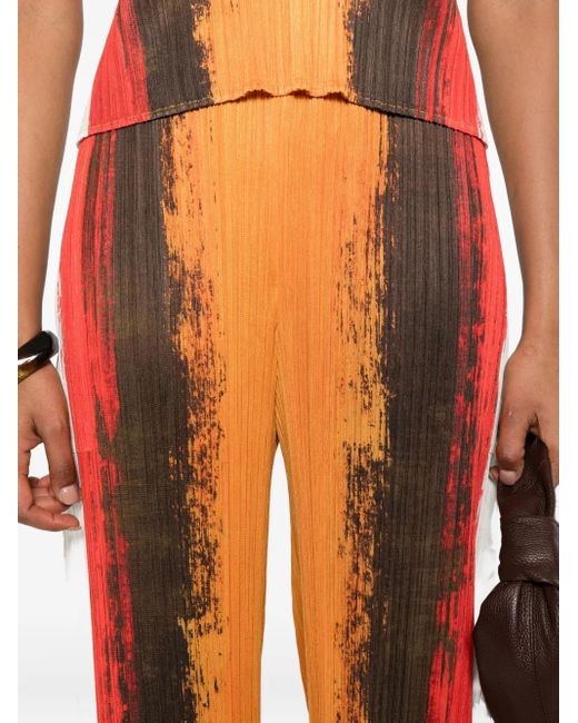 Pleats Please Issey Miyake Orange Pleated Stripe Trousers