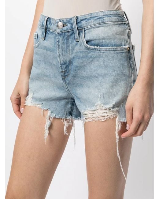 Short En Jean À Effet Usé FRAME en coloris Blue