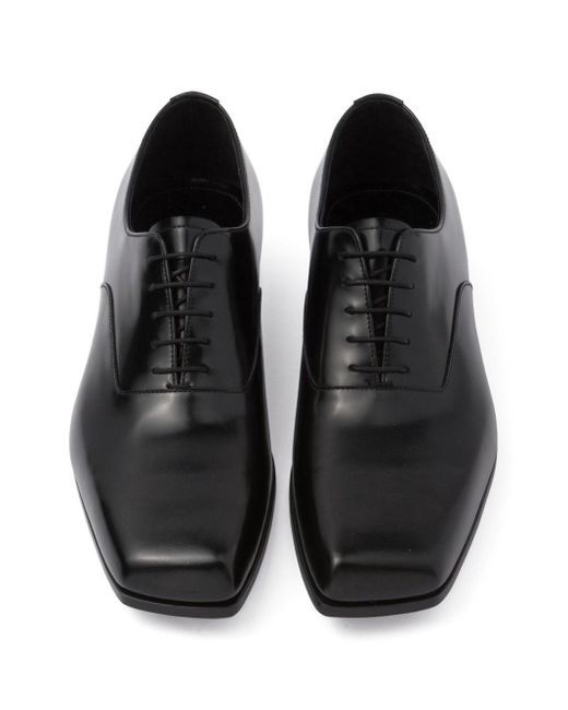 Chaussures en cuir à bout carré Prada pour homme en coloris Black