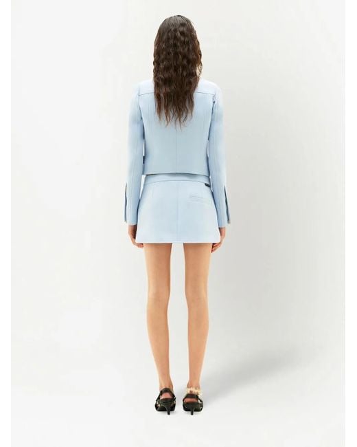 Minifalda de sarga con diseño redondeado Courreges de color Blue