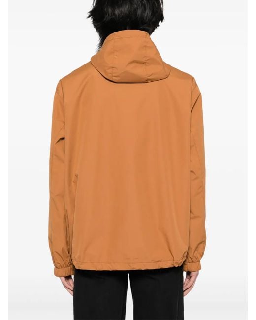 Cortavientos Con Capucha Chocoolate de hombre de color Orange