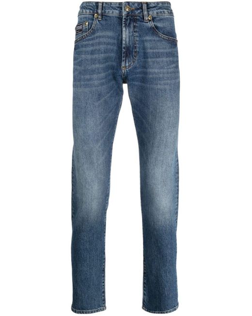 Versace Blue Logo-appliqué Slim-cut Jeans for men