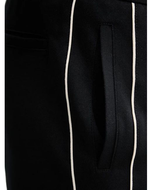 ARMANI EXCHANGE Black Logo-Print Piped Track Pants for men