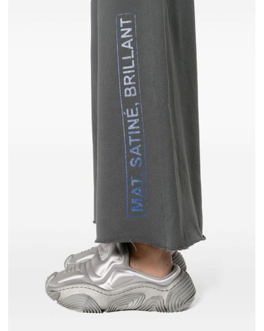 Pantalon de jogging ample à slogan imprimé MM6 by Maison Martin Margiela en coloris Gray